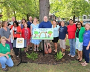 Parents, teachers and administrators from Conte West Hills Magnet School join staff from Common Ground, Audubon CT, and US Fish & Wildlife Service to celebrate the unveiling of their Schoolyard Habitat alongside their School Garden in Fall 2016. Photo credit: Suzannah Holsenbeck